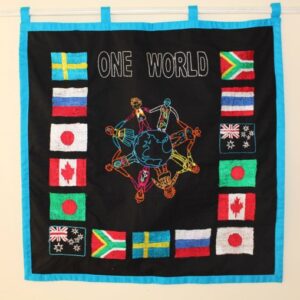 one world wall hanging